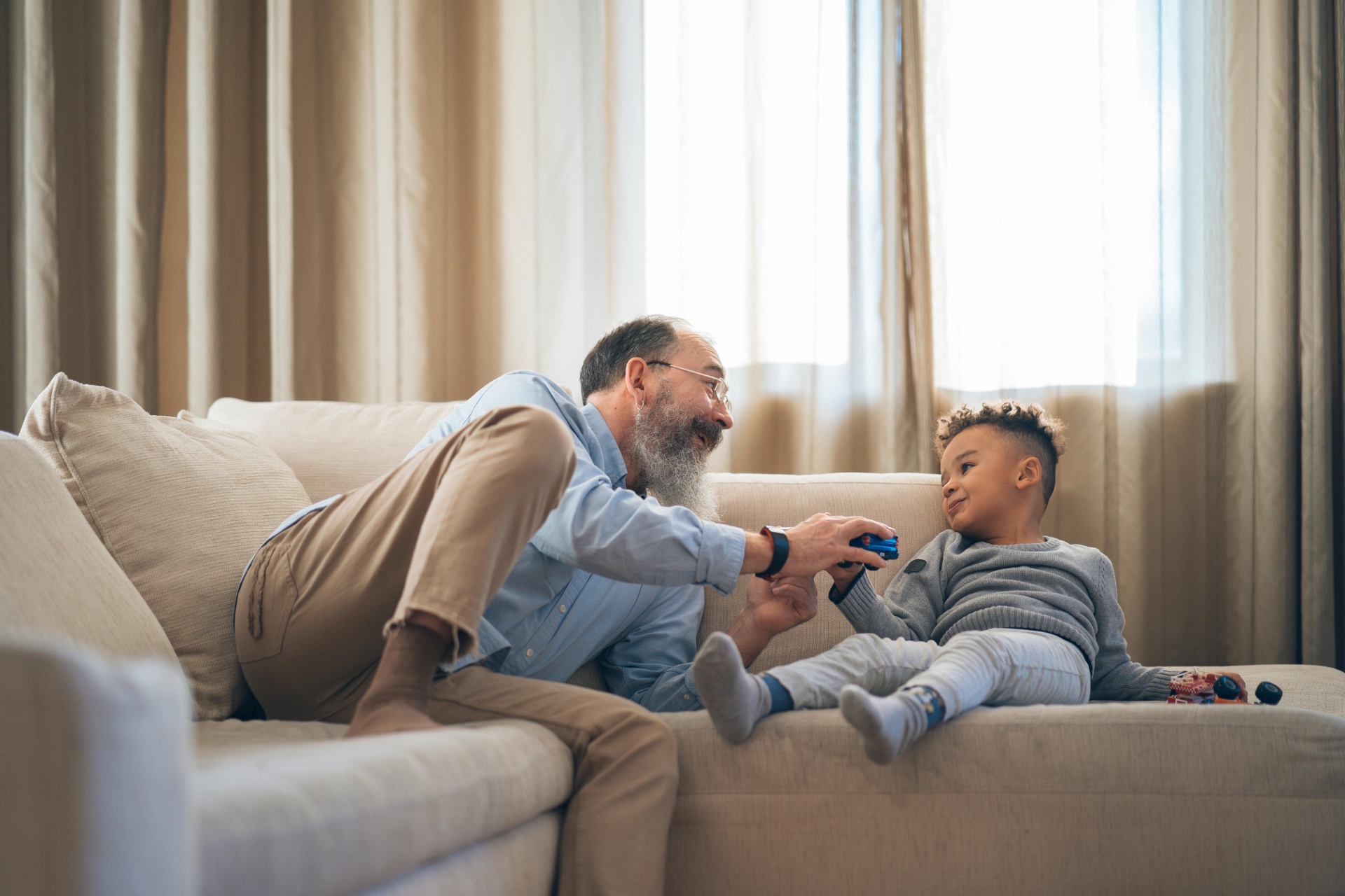 Grandfather and child illustrating whole of life insurance for inheritance planning